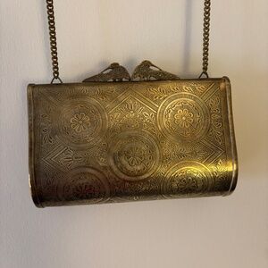 Brass evening bag, with birds clasp and chain shoulder strap